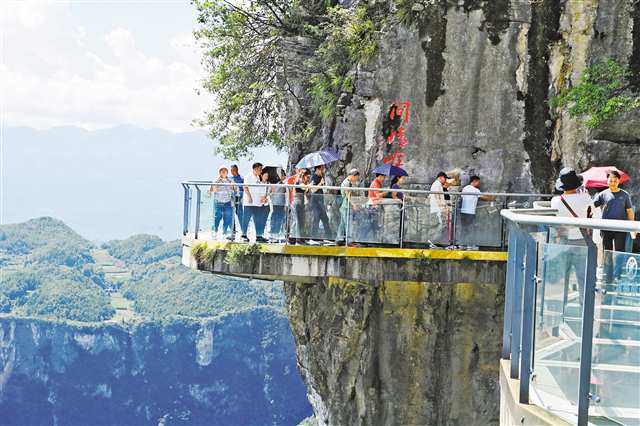 On June 28, tourists enjoying their time at Longgang Scenic Area in Yunyang County