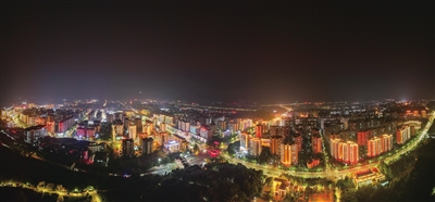 An aerial view of the Shuanggui urban area aglow with radiant nightscapes (Photographed by Xiong Wei)