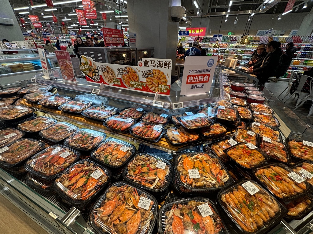 盒馬協信星光店內的“小吃街”。受訪者供圖