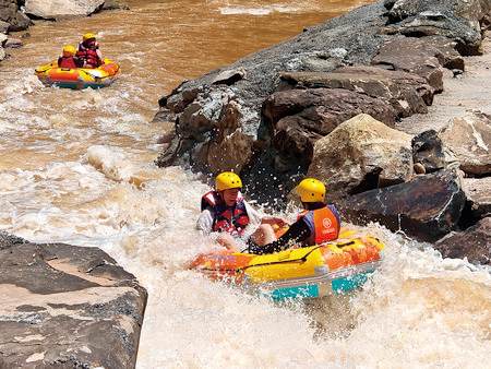 Tourists navigating the waterway